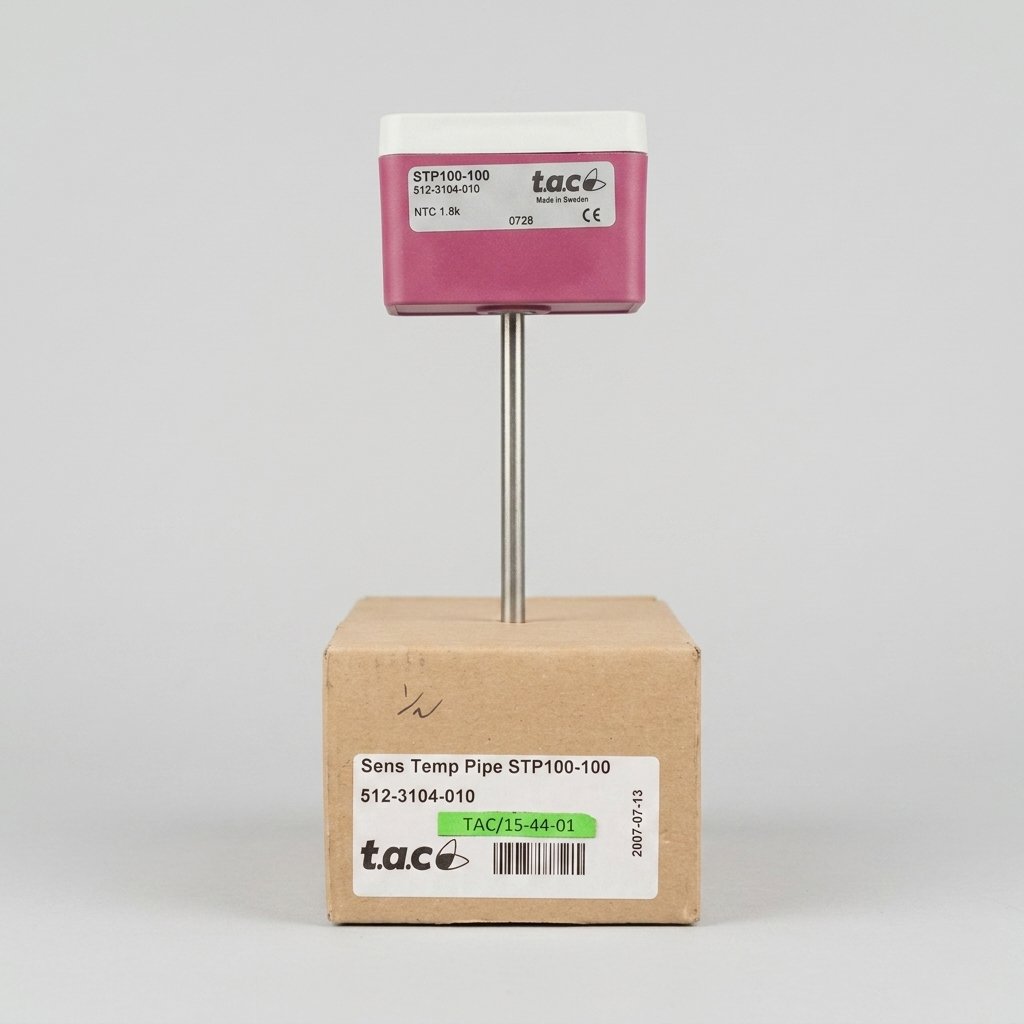 A studio photograph of a t.a.c. STP100-100 pipe temperature sensor with a magenta and white body and a stainless steel probe, standing above its brown cardboard product box. All clear identification labels and branding are sharp and legible against a plain grey background.
